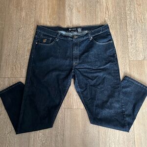 Dark blue Rocawear jeans slim fit.